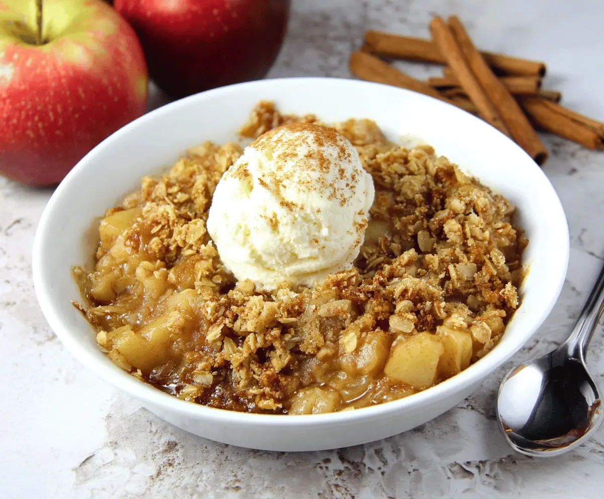 Delicious homemade almond flour apple crisp topped with golden brown crust and fresh apple slices, perfect for a healthy dessert