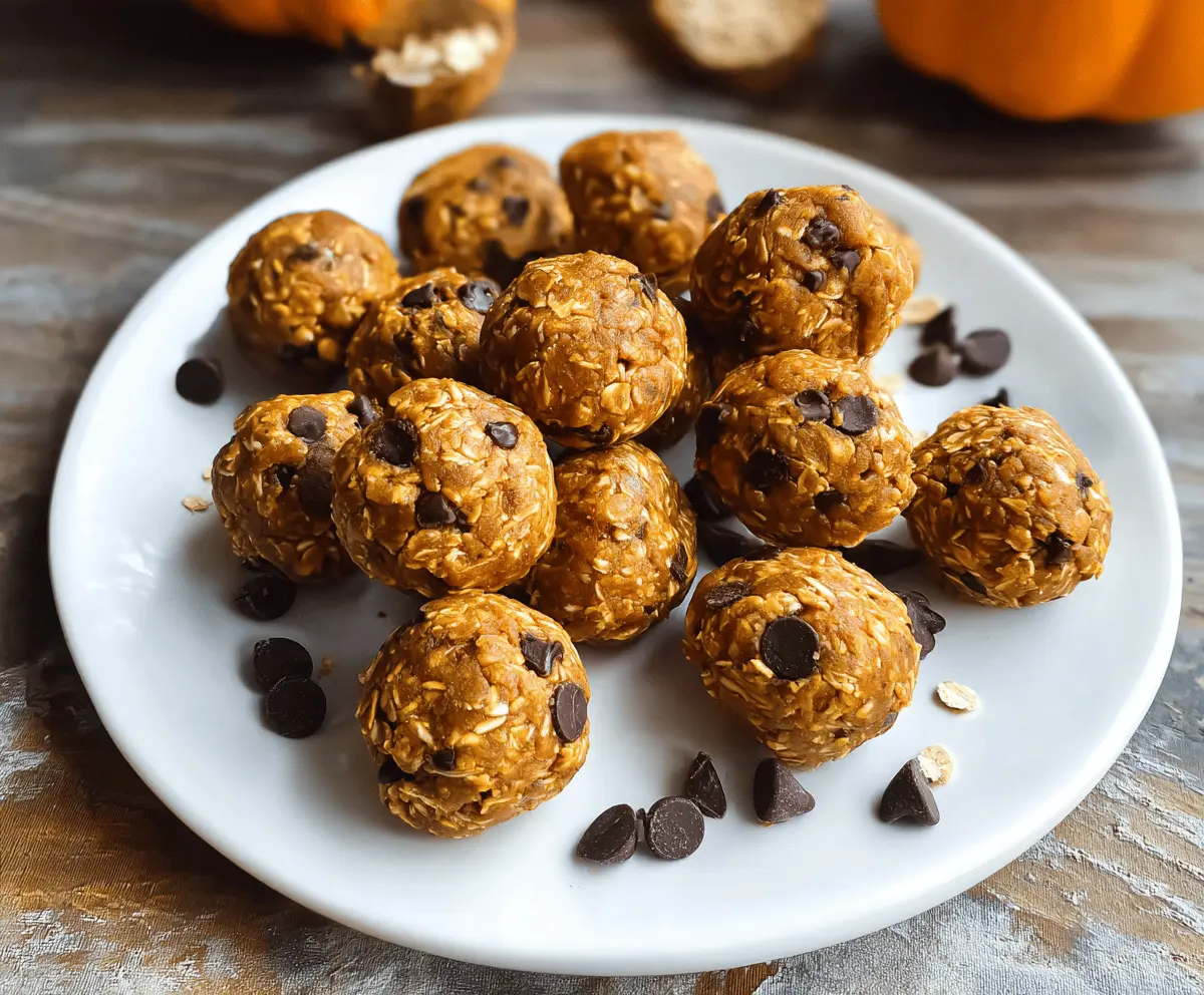 Delicious homemade Peanut Butter Pumpkin Protein Balls on a white plate, featuring a creamy peanut butter and pumpkin mixture with chia seeds, perfect for a healthy snack.
